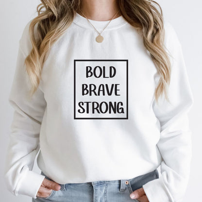 "Bold, brave, strong text design centered on white sweater."